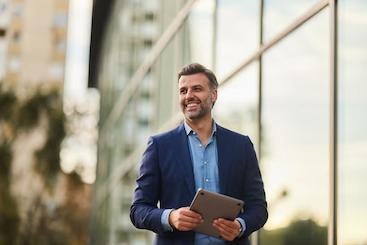 Man smiling in the city