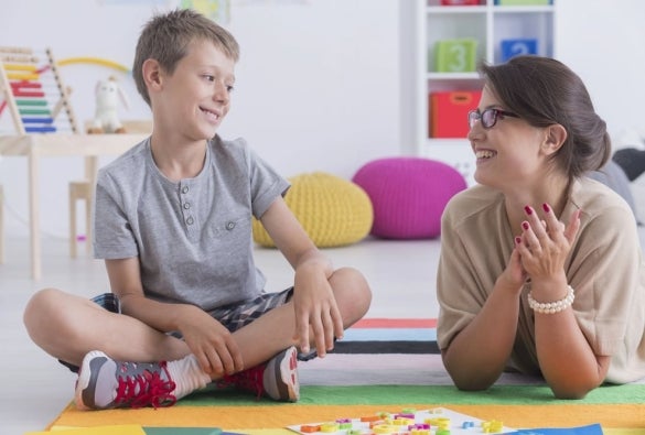 A school counsellor is having a casual conversation with a student.