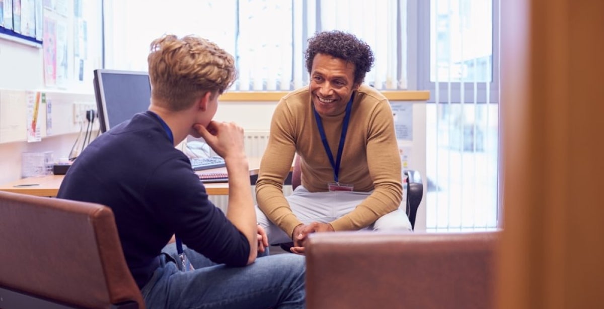 Mental health workers in a discussion at work.