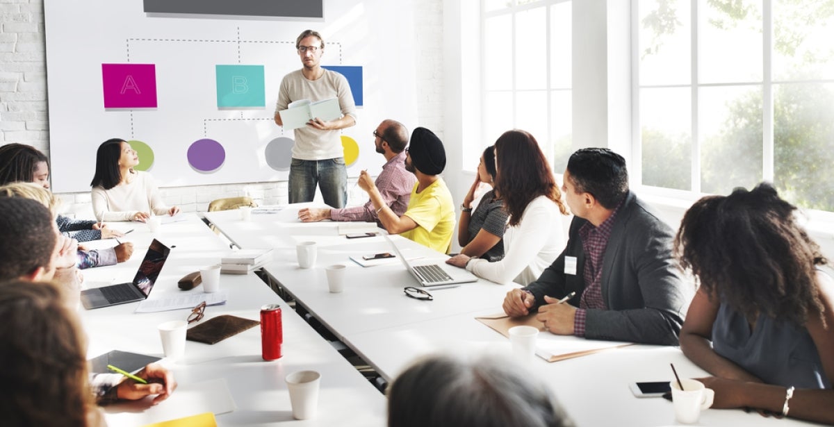 Business leaders in a meeting in a conference room.