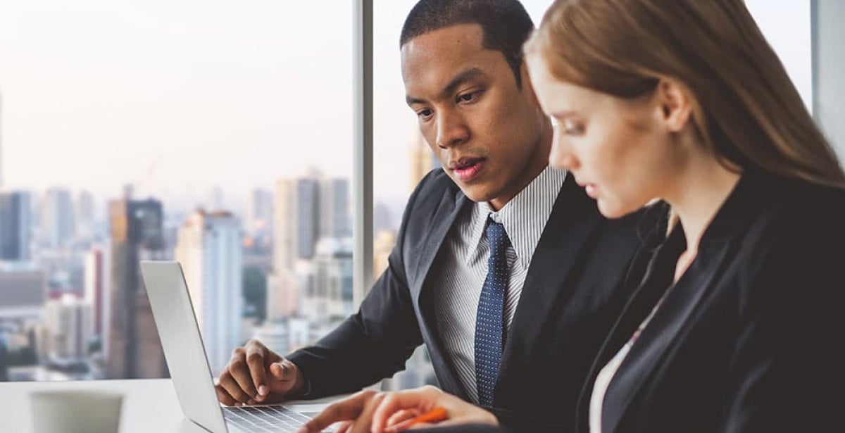 Two finance experts working together.