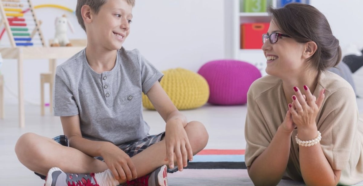 A school counsellor is having a casual conversation with a student.