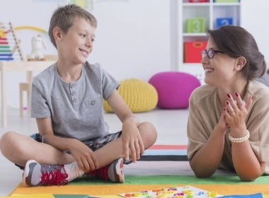 A school counsellor is having a casual conversation with a student.